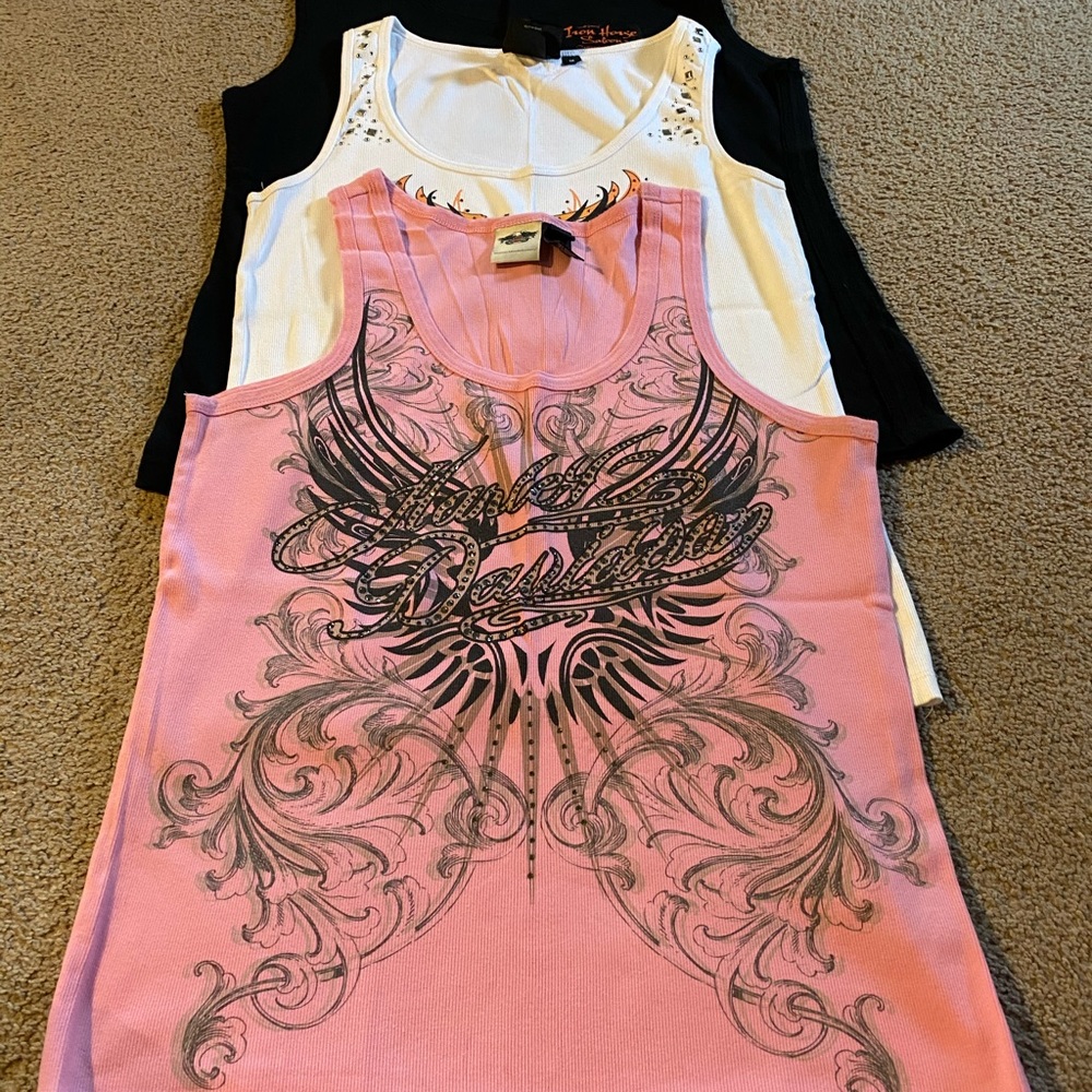 3 shirts 30$. Black xlg white 1w pink 2x